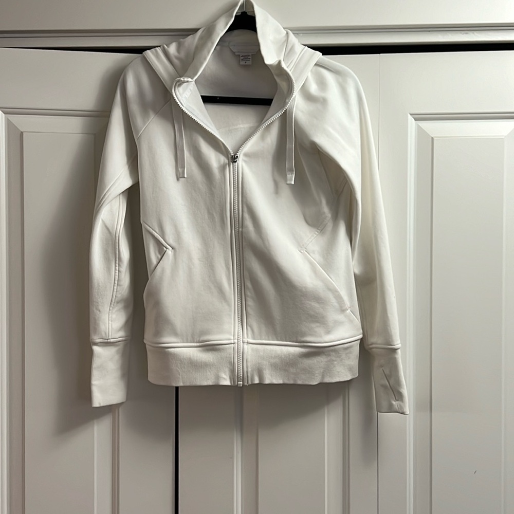Brand new white Athleta  zip up hoodie. No tags.